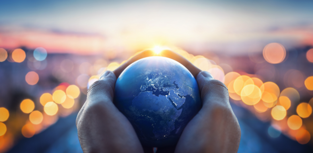 Person holding the Earth in their hands