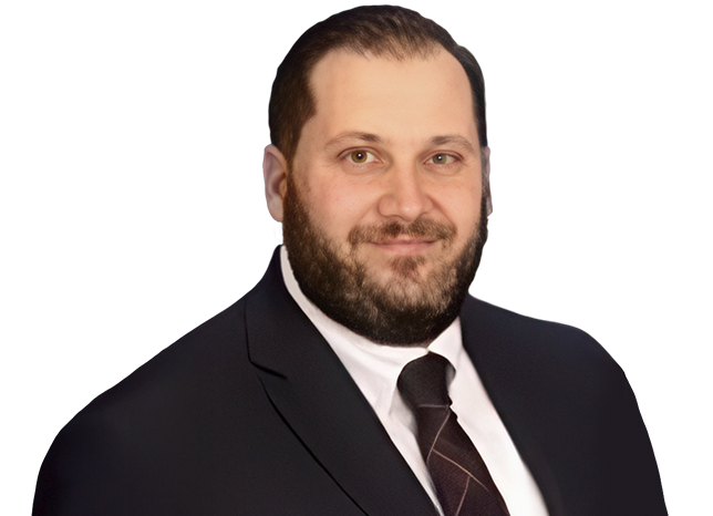 Man with beard wearing a suit and tie