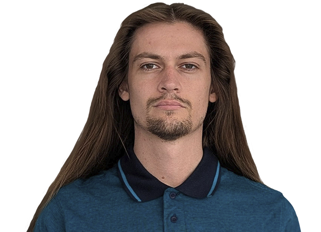 Person wearing collared shirt posing for photo