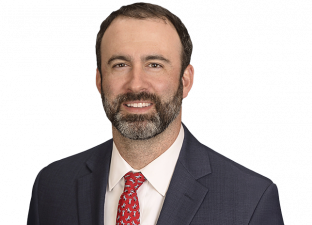 Guy with beard wearing a suit and tie